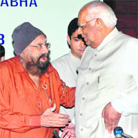 Lok Sabha speaker Somnath Chatterjee greets Khushwant Singh before presenting the National Amity award to him in New Delhi on Friday.