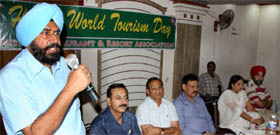 Mayor Baljeet Singh Birbehman speaking at a function in Bathinda on Saturday to mark the World Tourism Day.