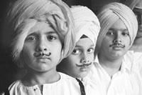 Schoolchildren dress up as Shaheed Bhagat Singh on the occasion of his 101st birth anniversary at DAV Public School, Patiala, on Saturday.