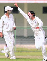 Gajender Singh celebrates the wicket of Australias Matthew Hayden