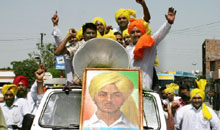 Youth taking out a procession on the occasion of 101st birth anniversary of Shaheed Bhagat Singh in Bathinda on Sunday.