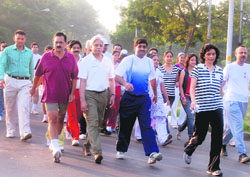 Chandigarh home secretary Ram Niwas and others participating in a walk on Sunday. 