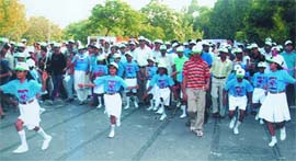 People participate in the Cornola World Heart Day walk from Shantivana to Raj Ghat in New Delhi on Sunday.