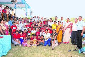 Deaf and dumb children with their prizes at the conclusion of Haryana Deaf and Dumb Children Sports Meet at Sirsa on Sunday. 