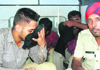 The motorcycle thieves in police custody in Ludhiana.