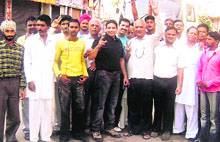 Activists of saffron parties on their way to take part in the Vijay Sankalap rally in Jalandhar.