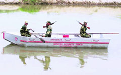 BSF personnel guard India-Pakistan border in the Jalalia river area in Gurdaspur district.