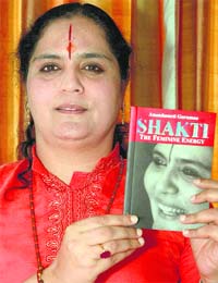 Anandmurti Gurumaa, with her book Shakti- The Fiminine Energy, during the book release in Sector 8, Panchkula