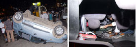A car overturns after hitting a tempo at the national highway of Rajiv Chowk in Gurgaon on Monday night.
