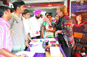A representative of a Canadian varsity interacts with students of the LPU in Phagwara on Tuesday.