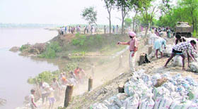 Gurlovleen Singh Sidhu, SDM (Jagraon), oversees work being carried out at Dhussi bundh.