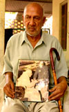 Dev Raj Bansal, first president of Bathinda Municipal Committee, holds a picture of C. Rajgopalchari, at the old age home.
