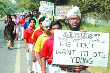 Students of Little Angel School take out a rally to spread traffic awareness in Kapurthala on Wednesday. Notably, a student of the school, Abhijeet, was crushed by a roadways bus a few days ago. 