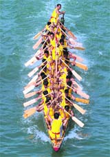 Rowers compete on the Liujiang River during a race to celebrate National Day in Liuzhou, Guangxi Autonomous Region, on Wednesday. China celebrated the 59th anniversary of the founding of the Peoples Republic of China on Wednesday.  Reuters