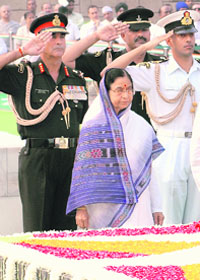 President Pratibha Patil pays homage to the Father of the Nation during the 139th birth anniversary celebrations of Mahatma Gandhi at Rajghat in New Delhi on Thursday. 