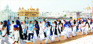 Winners of Gurbani Vichar Muhim contests at the Golden Temple in Amritsar on Friday.