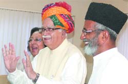 BJP leader L.K. Advani receives greetings from Najma Heptulla and other Muslim leaders who had gone to his residence to greet him on the occasion of Eid in New Delhi