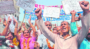 Members of the J&K Refugees Front protest in Jammu on Friday. 