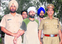 Gurjinder Singh Lucky in police custody. 