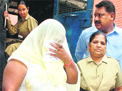 Shushma Bansal in police custody in Chandigarh. 