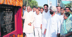 Chief Minister Bhupinder Singh Hooda lays the foundation stone of a railway overbridge in Sirsa on Sunday. 