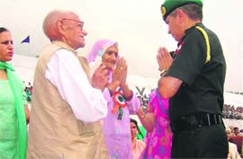 The GOC Rising Star Corps Lt-Gen Vinay Sharma meets Army veterans at the ex-servicemens rally at Yol cantonment on Sunday. A Tribune photograph