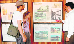 Eminent architect Surinder Bahga (right) of the Saakaar Foundation, makes a point to the visitors at a special exhibition at the Le Corbusier Centre in Chandigarh on Monday.