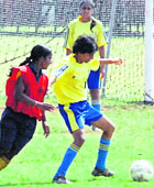 Players during a match of the Panjab University Inter-College Football (Women) Championship at Panjab University, Chandigarh.