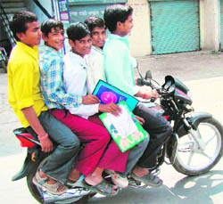 Youngsters flout traffic norms with impunity in Karnal.