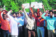 Members of the Lok Janshakti Party protest in support of their demands in Jammu on Monday.