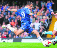 Chelseas Joe Cole scores the opening goal against Aston Villa at Stamford Bridge stadium on Sunday. 