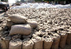 The bags of paddy, PAU 201 variety, that is not being lifted, lying at the Bathinda grain market.