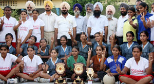 Members of the Bathinda team that won the netball championship, Punjab, at Gurdaspur recently, pose with DEO Baljinder Singh Mann and Dilbagh Singh Talwar in Bathinda on Tuesday.