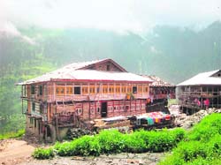 Stone-roofed houses depict architectural marvel of the village.