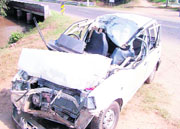 The mangled remains of a car that met with an accident at Chowkiman.