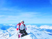 She scales the peak of Mount Everest