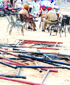 Cops guard the grain market at Chheharata in Amritsar on Wednesday.