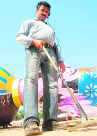 A security personnel inspects the Parade Ground ahead of the Dussehra celebrations in Jammu on Wednesday.