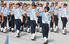 Air Force personnel march during the Air Force Day parade at Hindon in Ghaziabad. The IAF celebrated its 76th anniversary on Wednesday.