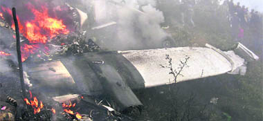 Burning remains of the Yeti Airlines DeHavilland DHC-6 Twin Otter plane, which crashed while landing at Lukla airport, 60 km from Mount Everest, in Nepal on Wednesday.