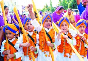 Kids dressed as Panj Pyaras during a function to mark Gurpurb celebrations in Amritsar.