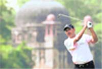 Jeev Milka Singh plays a fairway stroke during the first round of the Hero Honda Indian Open at the Delhi Golf Club in New Delhi 