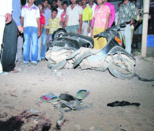 The scene of a accident in Gurgaon in which a father and his daughter were killed when a canter collided with their scooter on Thursday night.