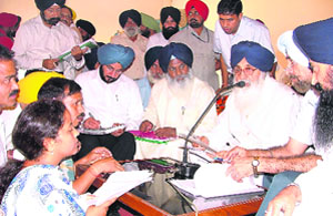 CM Badal listens to the greivances during the sangat darshan in Ludhiana on Friday. 