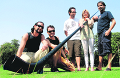 Eliana Burki and members of her rock band.