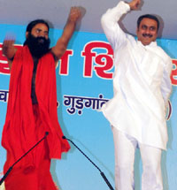 Dr Ambumani Ramdoss, union health minister, inaugurates Swami Ramdevs camp in Gurgaon.