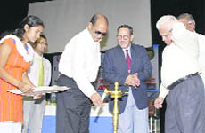 Vice-chancellor of Gautam Budh University R.S. Nirjar lights a lamp to inaugurate the iSACH08 at NIT in Hamirpur on Saturday.