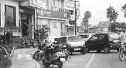 Parking on the road in front of a hotel in Patiala.
