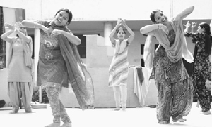 Girls rehearse on the eve of Punjabi University Zonal Youth Festival at Multani Mal Modi College in Patiala on Sunday.