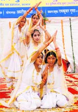 Girls present an item during a function organised by the Agarkul Sewa Sansthan to mark Maharaja Agrasen Jayanti in Karnal on Sunday. 